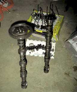 The old cam and the new blower cam, rods & Lifters